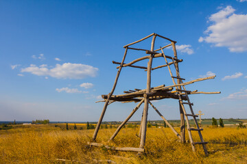 old wooden structure among prairie, ethnical rural scene
