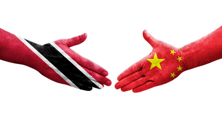 Handshake between China and Trinidad Tobago flags painted on hands, isolated transparent image.