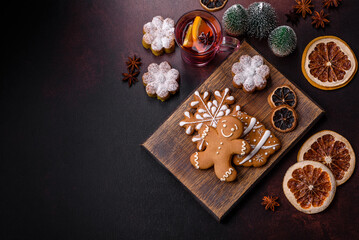 Hot mulled wine with a slice of orange, with cinnamon, cloves and other spices