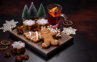 Hot mulled wine with a slice of orange, with cinnamon, cloves and other spices