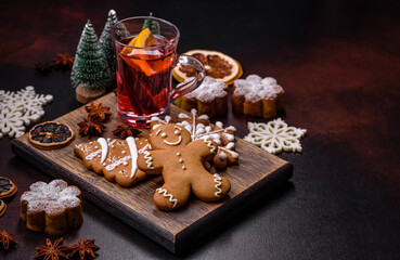 Hot mulled wine with a slice of orange, with cinnamon, cloves and other spices