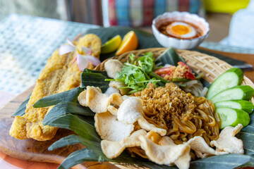 Thai cuisine, crispy fish fillet and pad thai