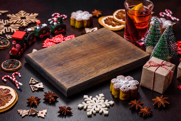 Hot mulled wine with a slice of orange, with cinnamon, cloves and other spices