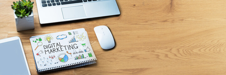 Notepad Showing Digital Marketing Diagram On Wooden Desk