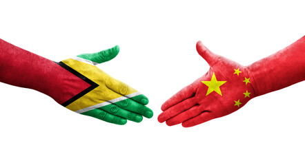 Handshake between China and Guyana flags painted on hands, isolated transparent image.