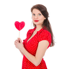 Beautiful woman in red dress with red heart-shaped lollipop isolated on transparent background
