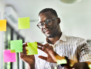 business meeting note paper man young office businessman strategy idea glass portrait success confident presentation startup sticky brainstorming creative