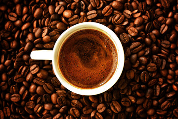 cup of coffee with beans