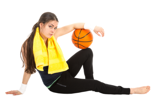 Pretty woman in sports wear sitting on floor with basketball, isolated on transparent background