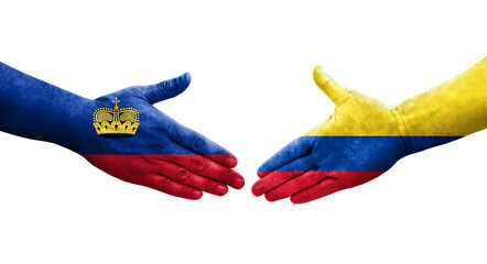 Handshake between Colombia and Liechtenstein flags painted on hands, isolated transparent image.