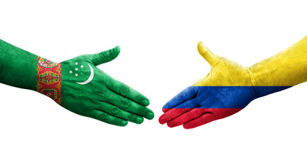 Handshake between Colombia and Turkmenistan flags painted on hands, isolated transparent image.