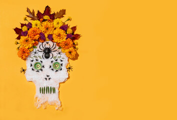 Image of Mexican skull with marigold flowers. Celebration of Mexico's Day of the Dead (El Dia de Muertos)