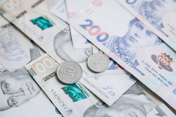 Money of Ukraine. Banknotes of 200 and 500 hryvnia lie together. Monetary system. Currency of Ukraine. Hryvnia.