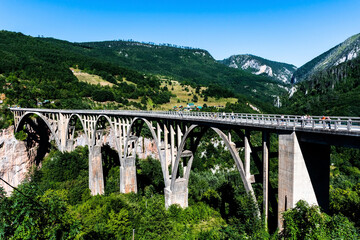 Fototapeta na wymiar Durdevica bridge through the Tara river canyon. Durmitor National Park. Montenegro.