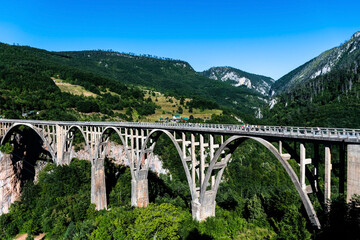 Fototapeta na wymiar Durdevica bridge through the Tara river canyon. Durmitor National Park. Montenegro.
