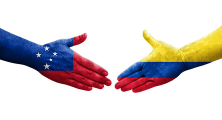Handshake between Colombia and Samoa flags painted on hands, isolated transparent image.