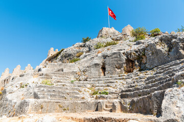 Small ancient amphitheatre in ruined Simena castle in Kalekoy village of Kekova region in Antalya province, Turkey