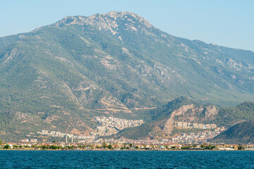 Fototapeta na wymiar Ari Dagi mountain (1,626m) towering over Fethiye town on the Mediterranean coast of Turkey.