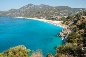 Fototapeta na wymiar Mediterranean coastline in Oludeniz beach resort in Mugla province of Turkey.