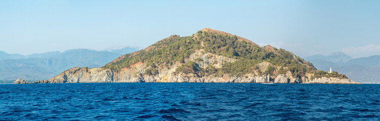 Fototapeta na wymiar Kizil Ada island off the Fethiye coast in Mugla province of Turkey.