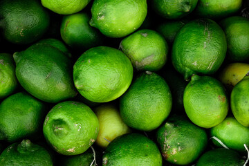 Numerous limes in the markets. Caipirinha base fruit in Brazil.