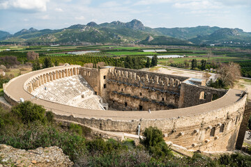 Exterior view of the the Roman antique theatre building at Aspendos ancient site in Turkey