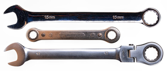 Mechanical flat wrenches on an isolated background.