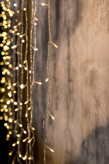Christmas and New Year Background with Holiday Decoration garland, tinsel and stars. Abstract...