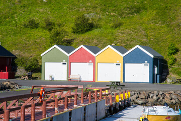 Colorful buildings in port of village of Hjalteyri in Iceland