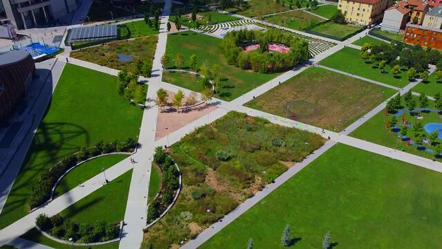 Lido Bam. Library of trees. Parco Biblioteca degli Alberi Milano - BAM. Italian city of fashion. Vertical forest. New urban architecture. aerial view of people. A park. Milan, Italy, 03.2023