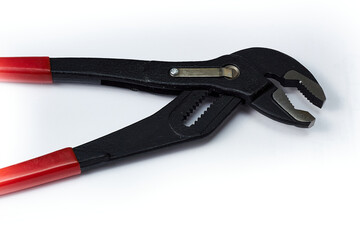 Wrench plumbing wrench on a white background.