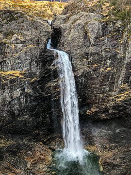 Vertical shot of Manafossen waterfall in Norway