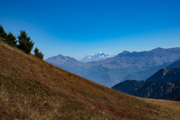 Mountain landscape in summer in the Alps in France with Mont Blanc in the distance
