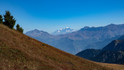 Mountain landscape in summer in the Alps in France with Mont Blanc in the distance
