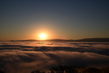 sunrise over the  clouds