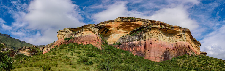 Fototapeta na wymiar A panoramic view of Mushroom Rock in the Golden Gate Highlands National Park. This nature reserve is part of the Maluti Mountains belonging to the Drakensberg range in South Africa.