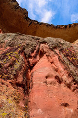 Looking up the cliff face of Mushroom Rock in the Golden Gate Highlands National Park. This is a nature reserve near the popular town of Clarens in the Free State, South Africa.
