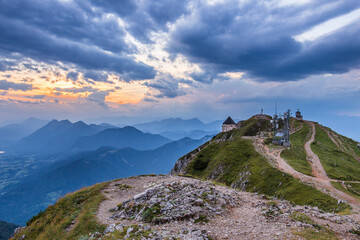 Fototapeta na wymiar A beautiful mountain landscape at the Dobratsch in Austria with a chapel and hiking trails