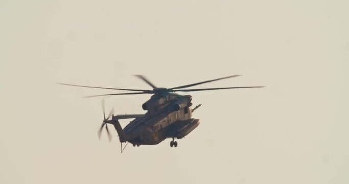 Military helicopter during a rescue mission in a base