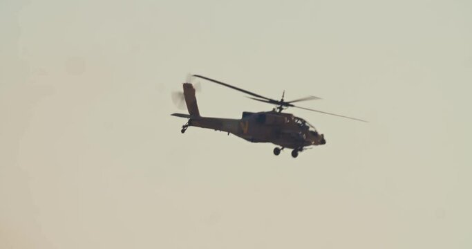 Apache Longbow military helicopter during combat flight