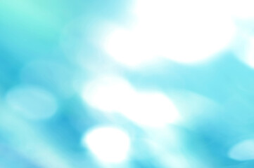 Blurred image of diving and light streaming down. The miracle of beauty under the water's surface