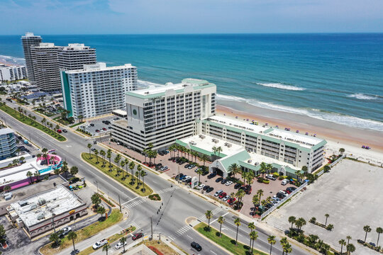 Aerial looking east over Daytona Beach, Florida beachfront hotels and condos toward the Atlantic Ocean.