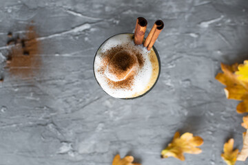 Spicy latte with pumpkin and whipped cream