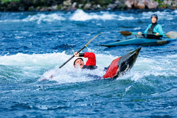 Banner whitewater kayaking, extreme water sport rafting. Man in kayak sails mountain river sunny day