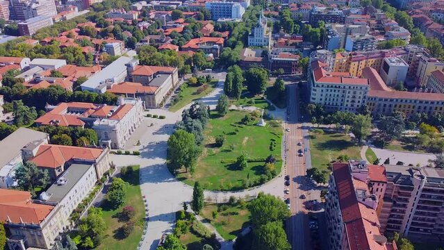 Aerial view of the cityscape and the main buildings of the Polytechnic University Interfacolt&agrave; PoliMi. Campus and library. Green lawns and trees. Students. Architecture. Milan Italy