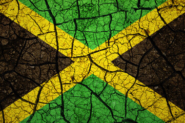 Dry soil pattern on the flag of Jamaica. Country with drought concept. Water problem. Dry cracked earth country.	