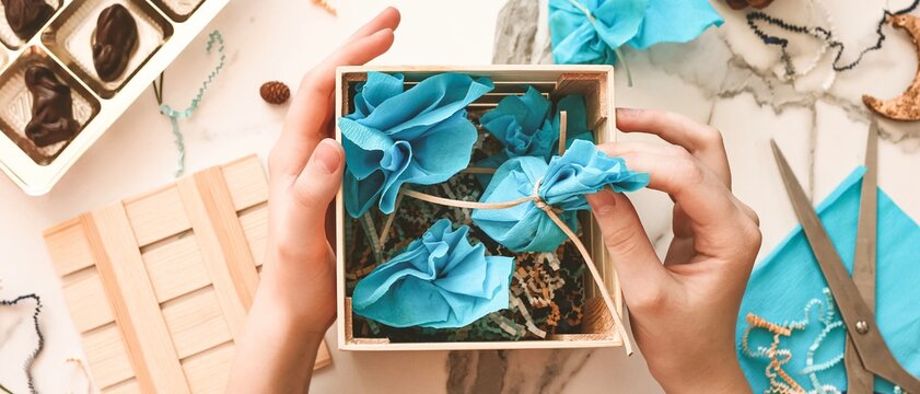 Teenage Girl Making Handmade Christmas Gift With Chocolate Sweets For New Year, Christmas Holidays. Do It Yourself Concept, Creativity, Step By Step Process. Banner.