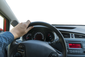 Man is driving a car. View from interior. Transparent window.