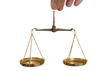 Hand is holding golden scale. Isolated on transparent background