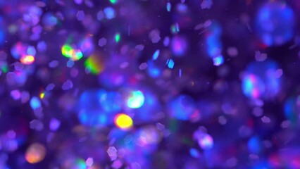 Shot of real glitter particles floating in water. Background of dust particles. Time lapse macro shot of defocused shiny bokeh. Abstract moving background in purple and rainbow colors. - Powered by Adobe